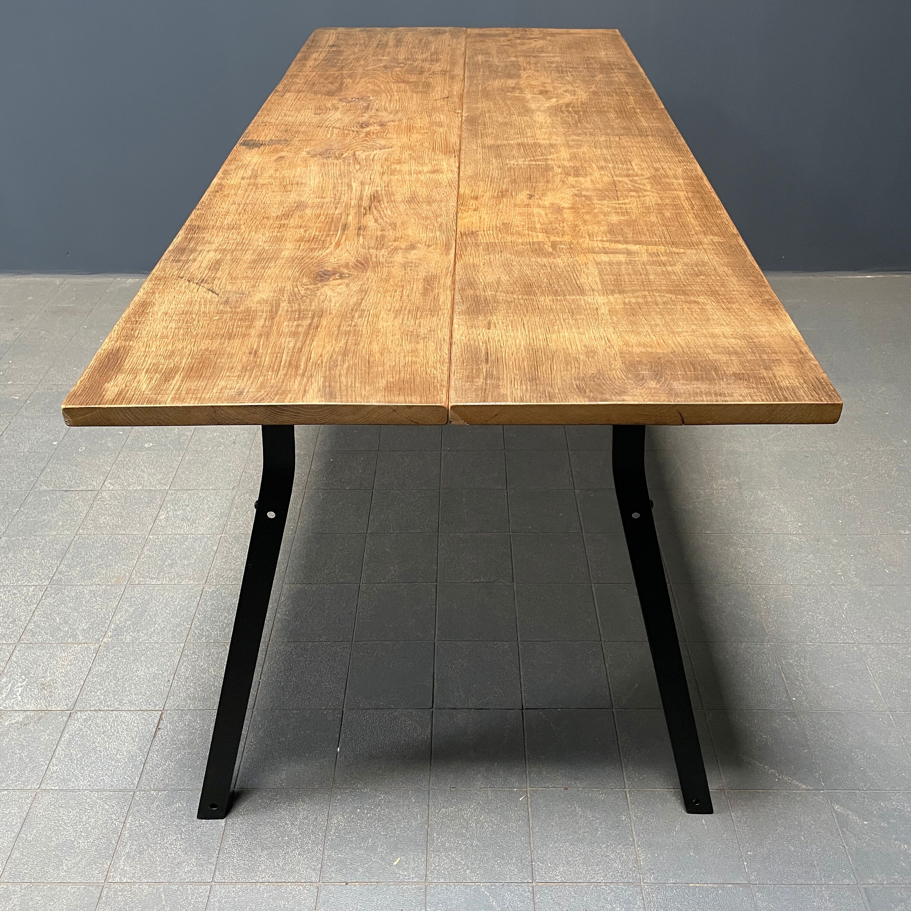 Handmade industrial oak dining table with black metal legs