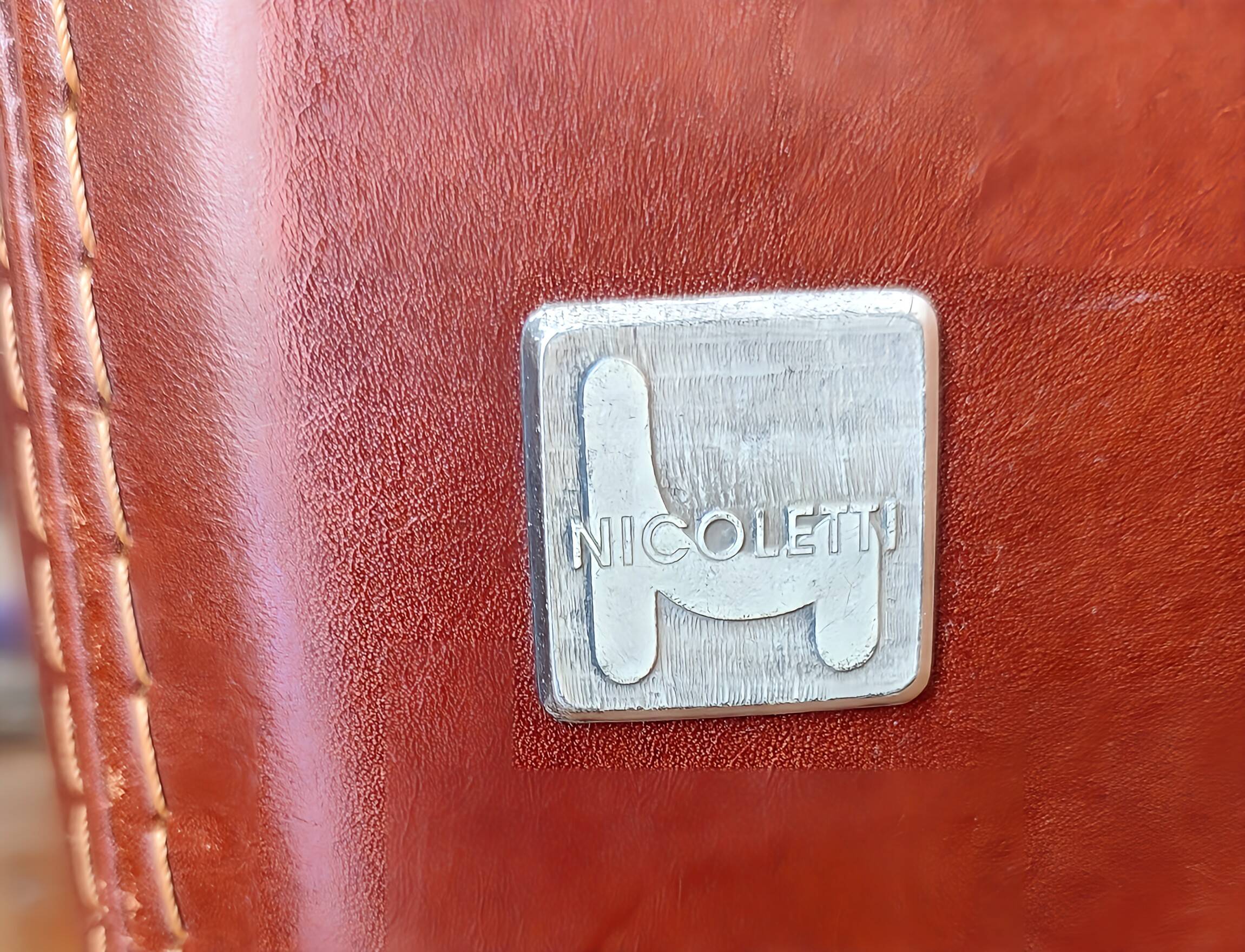 Genuine leather club chairs by Nicoletti, like new.
