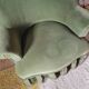 Green velvet armchair