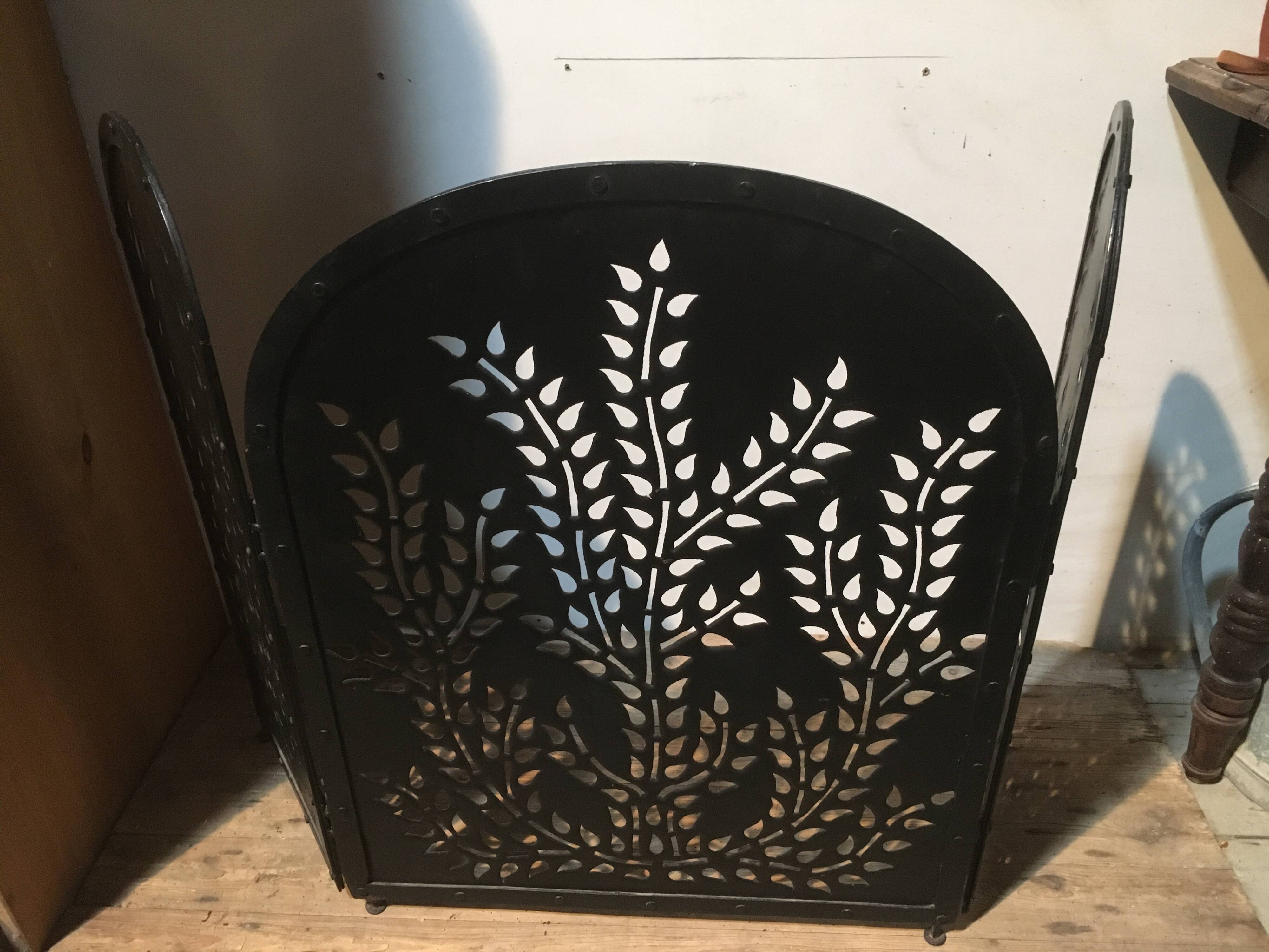 Wrought and cut metal fire screen