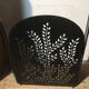 Wrought and cut metal fire screen