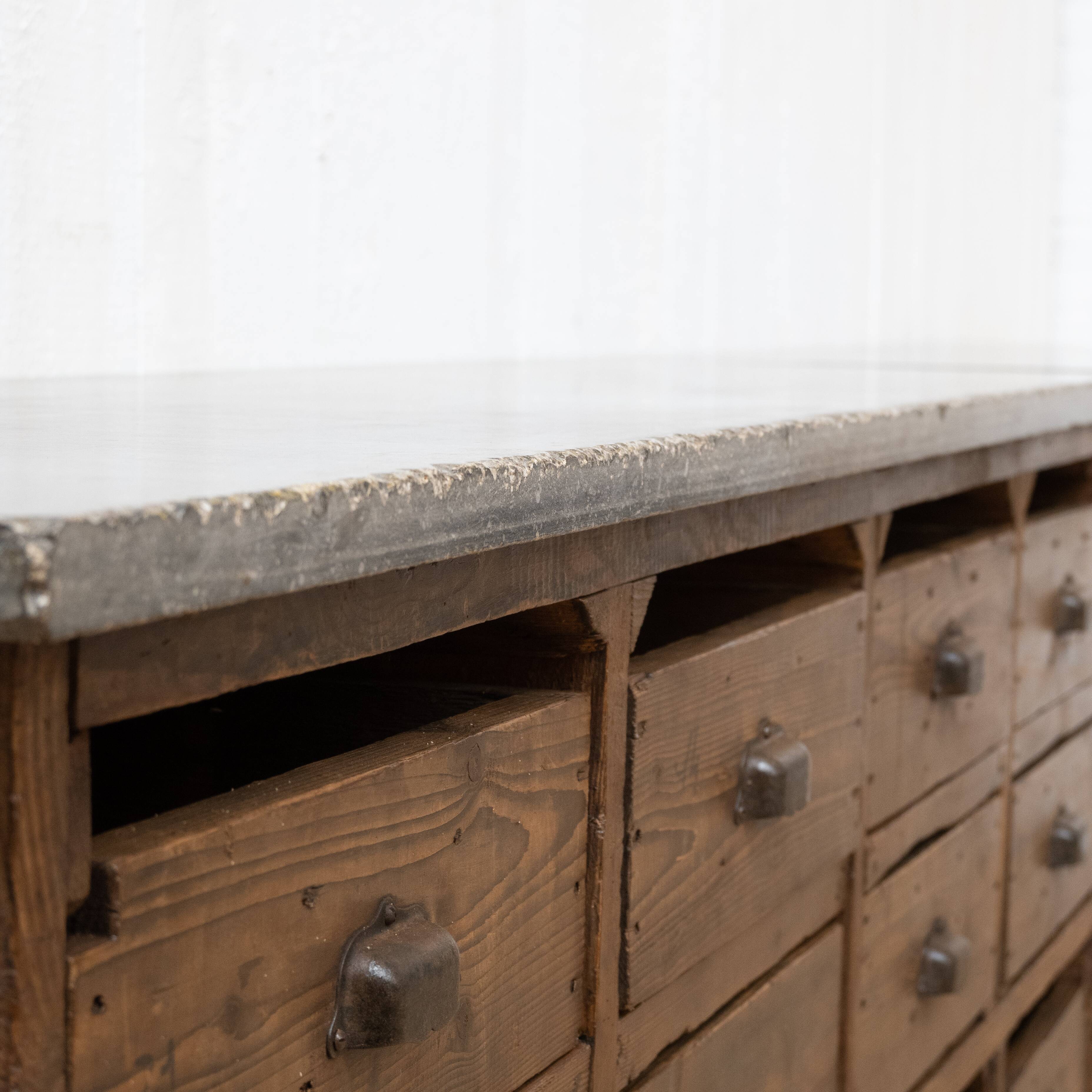 Craft cabinet with drawers in wood and blue stone