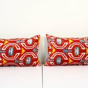 Set of two red ikat velvet lumbar pillows