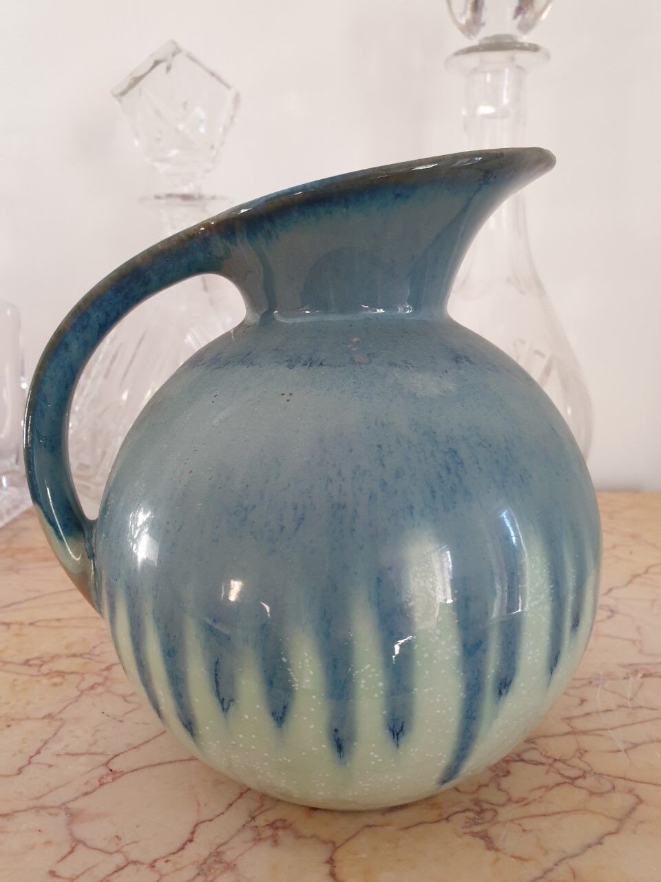 Glazed ceramic pitcher
