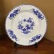 Round dish in Tournai porcelain, Boch Frères, fly decoration