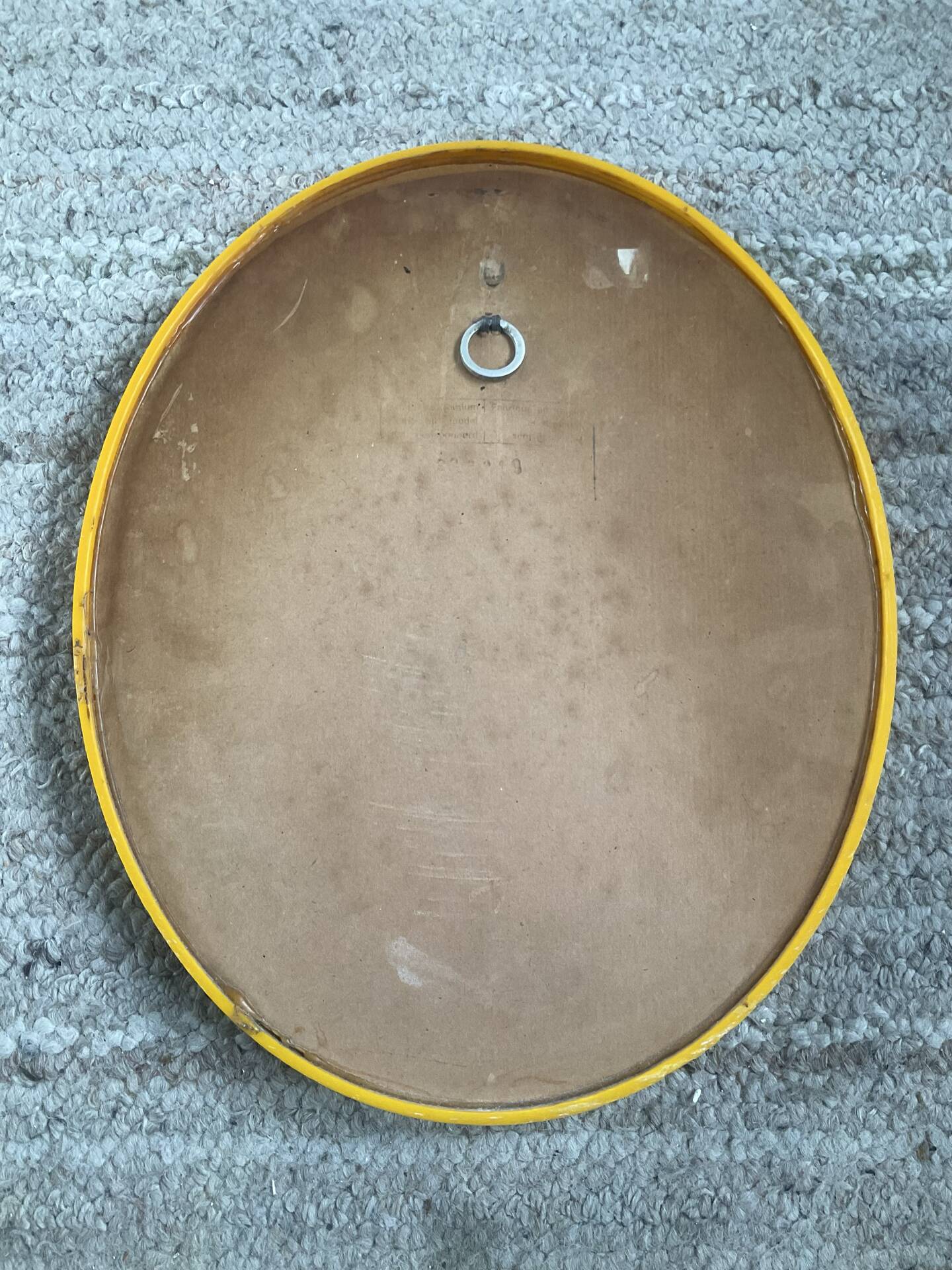 Vintage oval mirror from the 1970s.