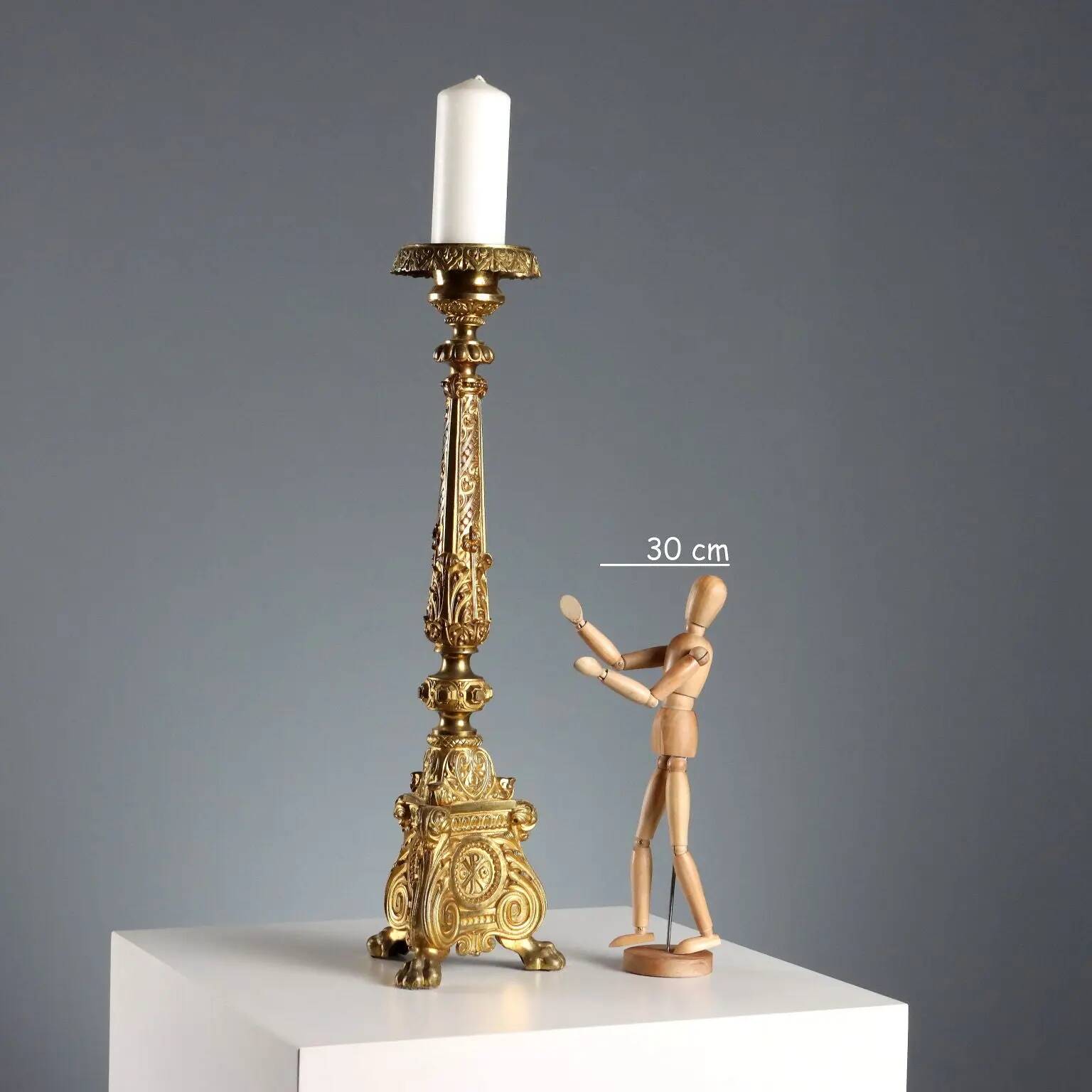 Antique gilded bronze candelabrum, 19th-century decorations.