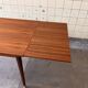 Extendable dining table in teak