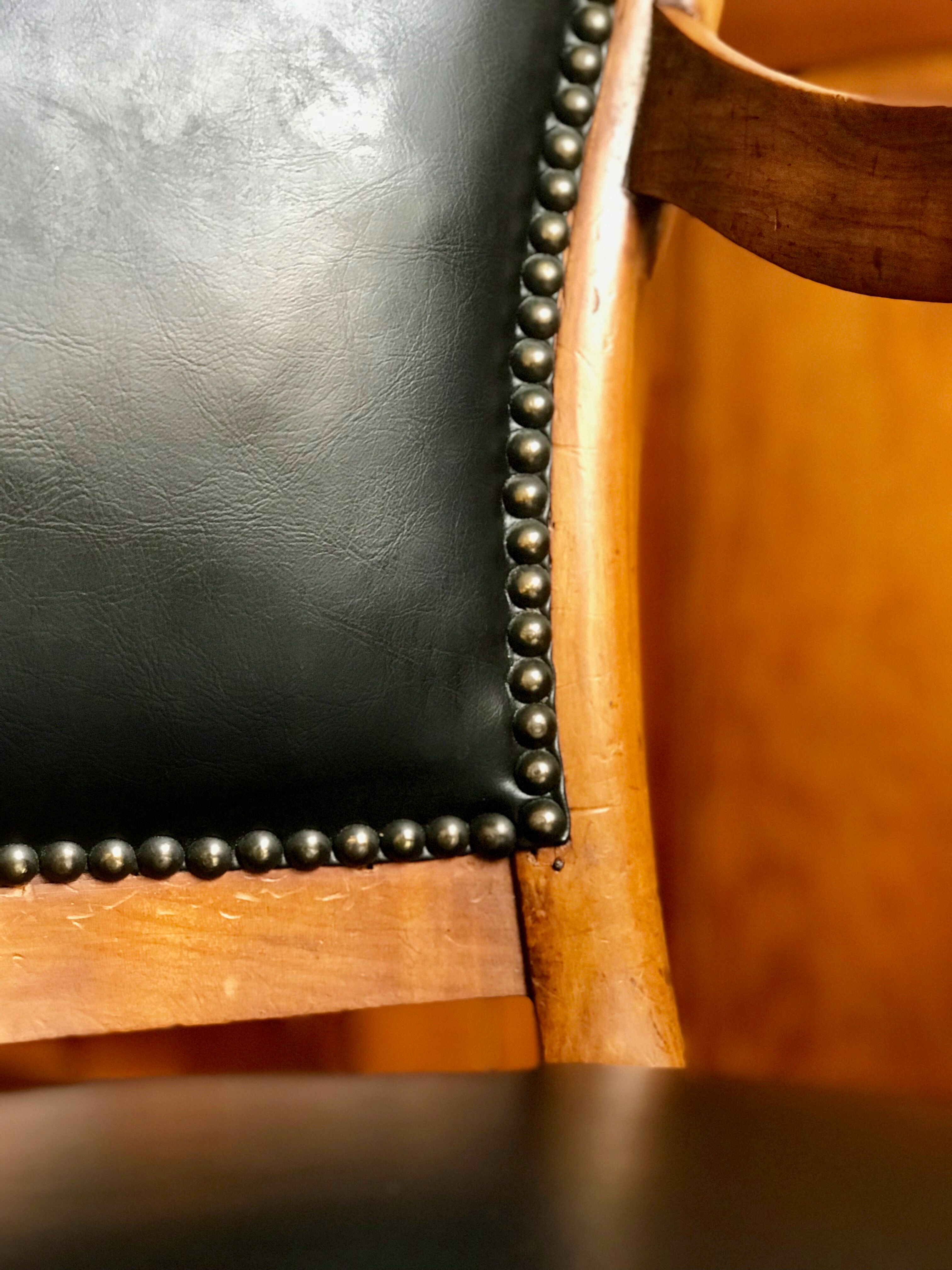 Wood and leather armchair