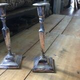 Pair of silver metal candle holders