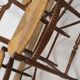 3 wooden and straw chairs, decorated with a sheaf of wheat.