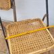 Pair of vintage metal and cane folding chairs