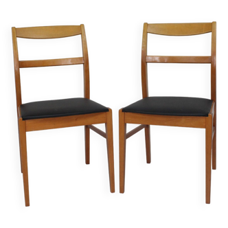 Pair of vintage teak chairs, black imitation leather seat, 1960s suede