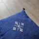 Coussin marocain bleu à pompon en coton