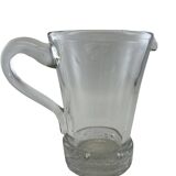 Large stylized glass pitcher
