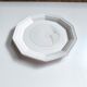 Round vintage Niderviller plate with a country decor.