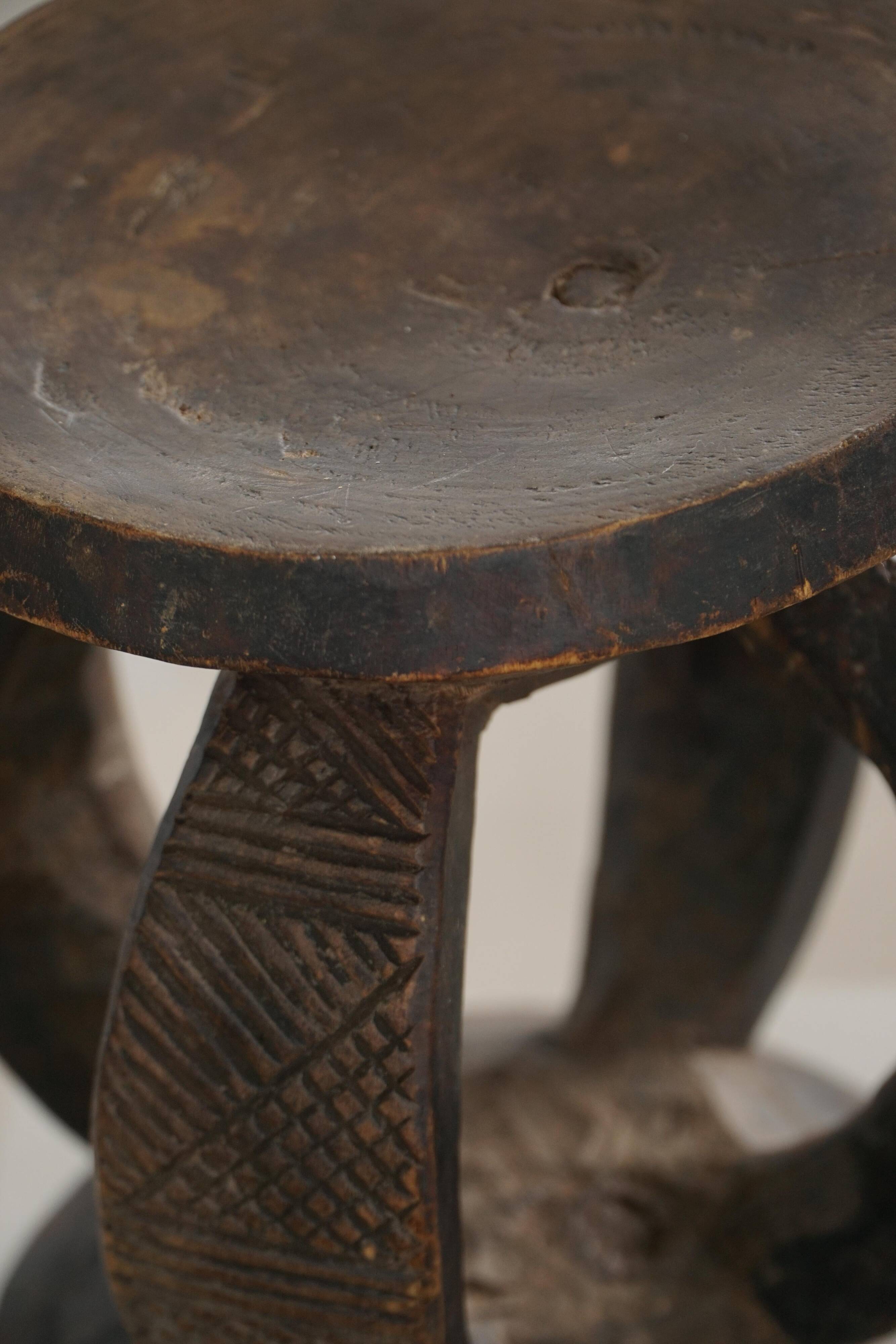 African Dogon stool from the mid-20th century, hand-carved in wood, Wabi-Sabi style.