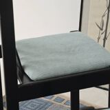 Set of 4 modernist black chairs with light blue ribbed fabric