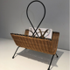 Rattan and black lacquered metal magazine rack