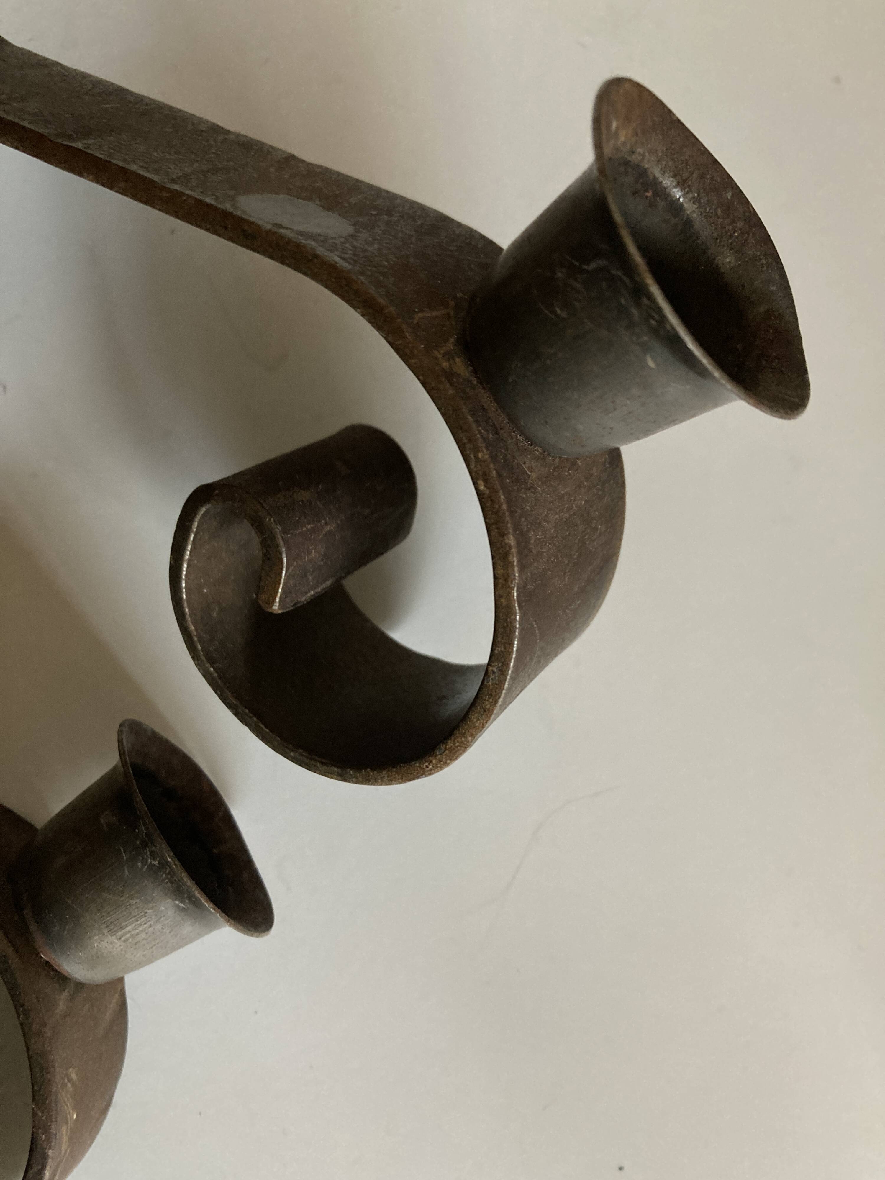 Pair of corrugated wrought iron candlesticks 1950