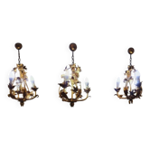 Set of 3 gold painted metal chandeliers