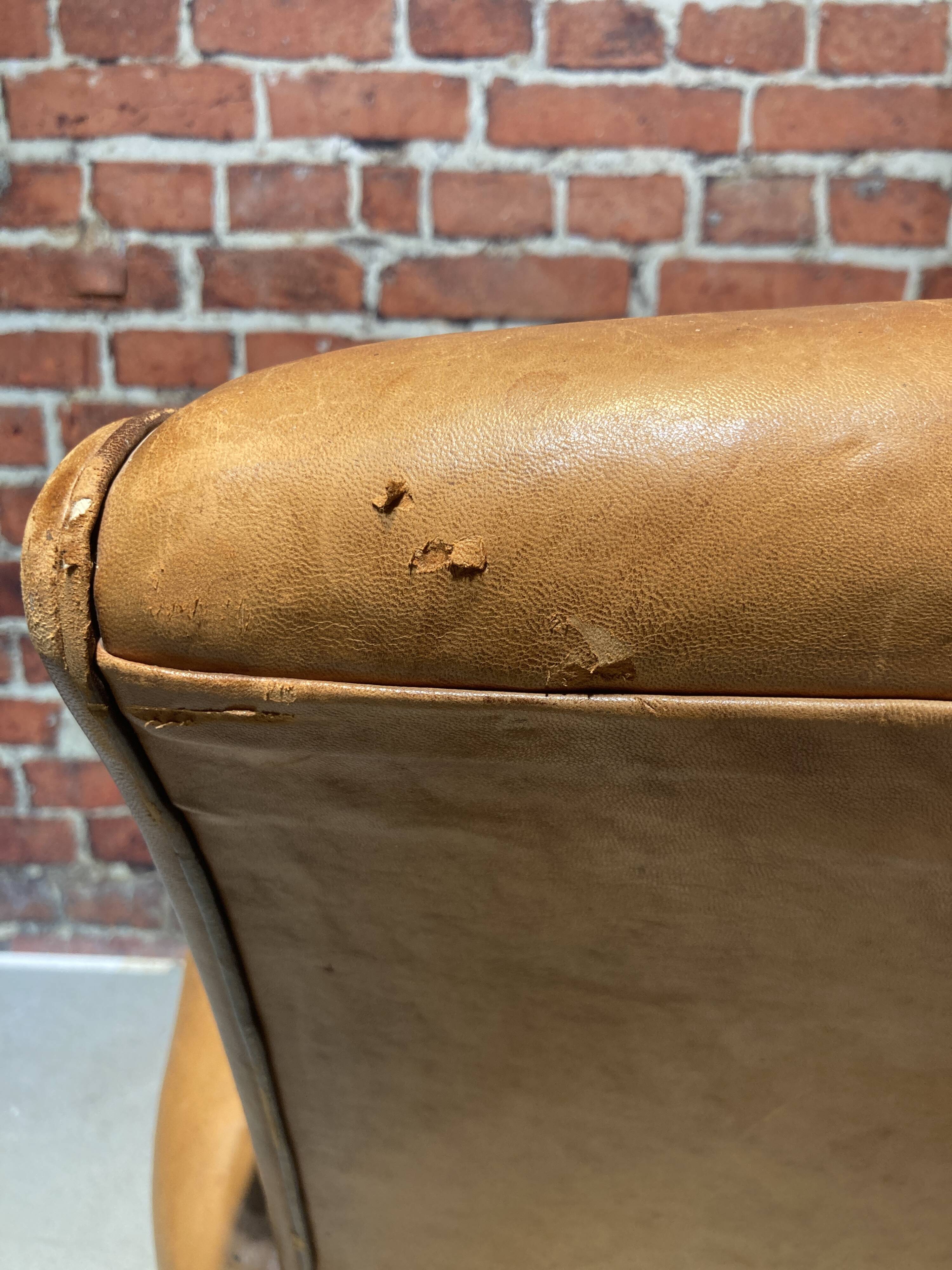 Brown leather armchair