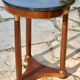 Empire side table in mahogany and mahogany veneer.
