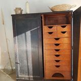 Old black wardrobe - wooden drawers and labels of origin