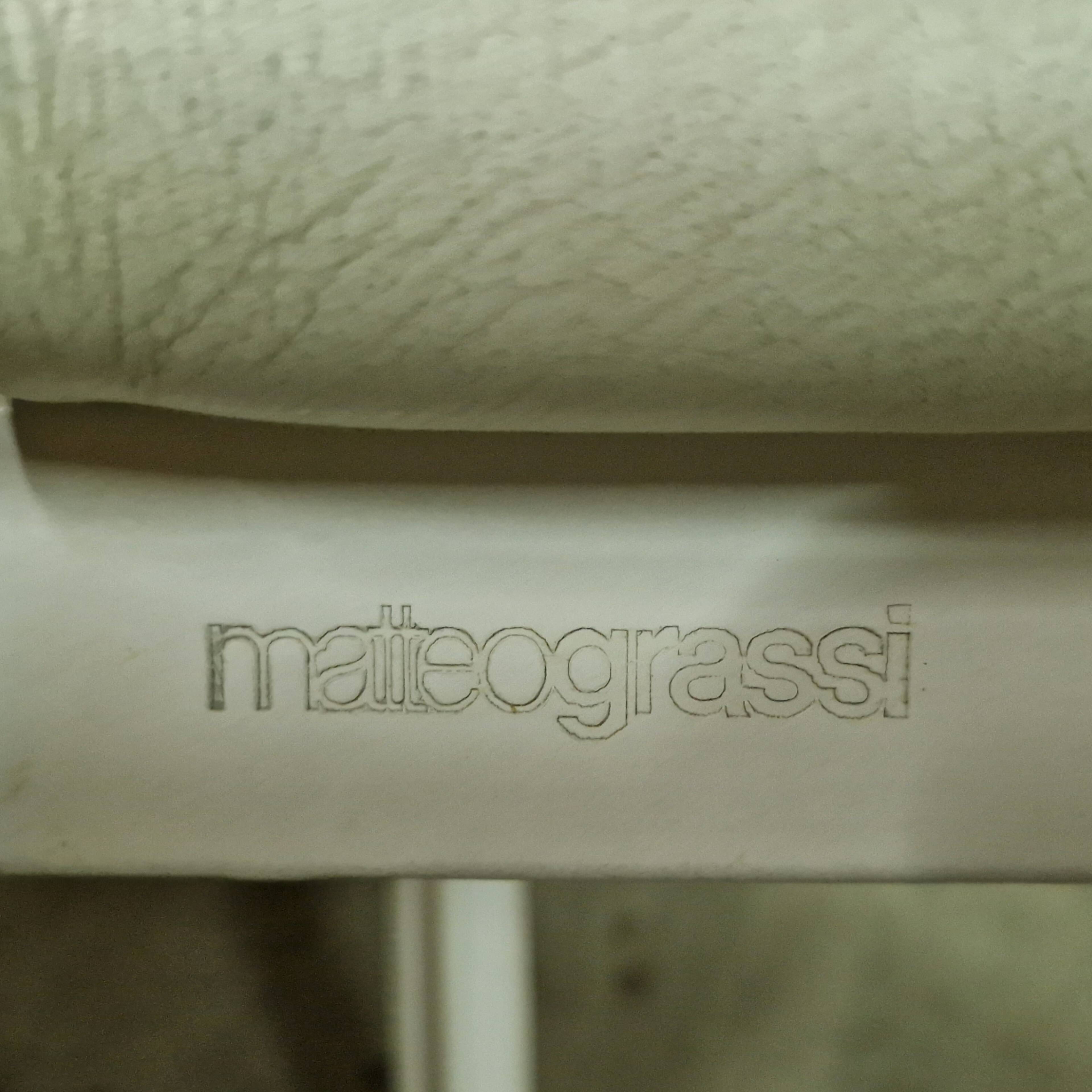 Set of 4 leather dining chairs by Jacques Toussaint and Patrizia Angeloni for Matteo Grassi. Italy 1