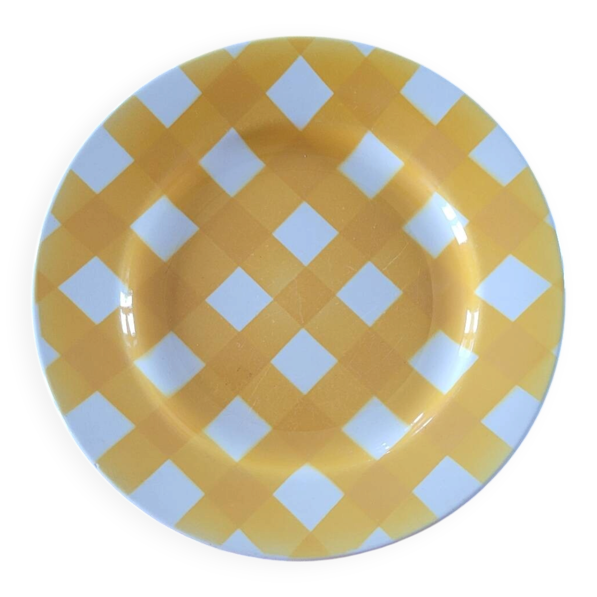 Une assiette plate Sarreguemines jaune et blanc