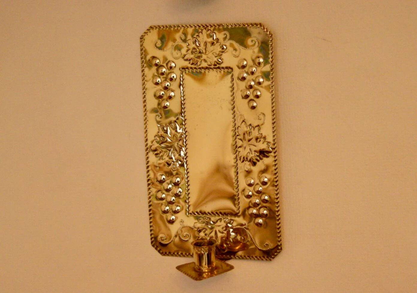 A pair of Swedish brass wall sconces from the mid-century.