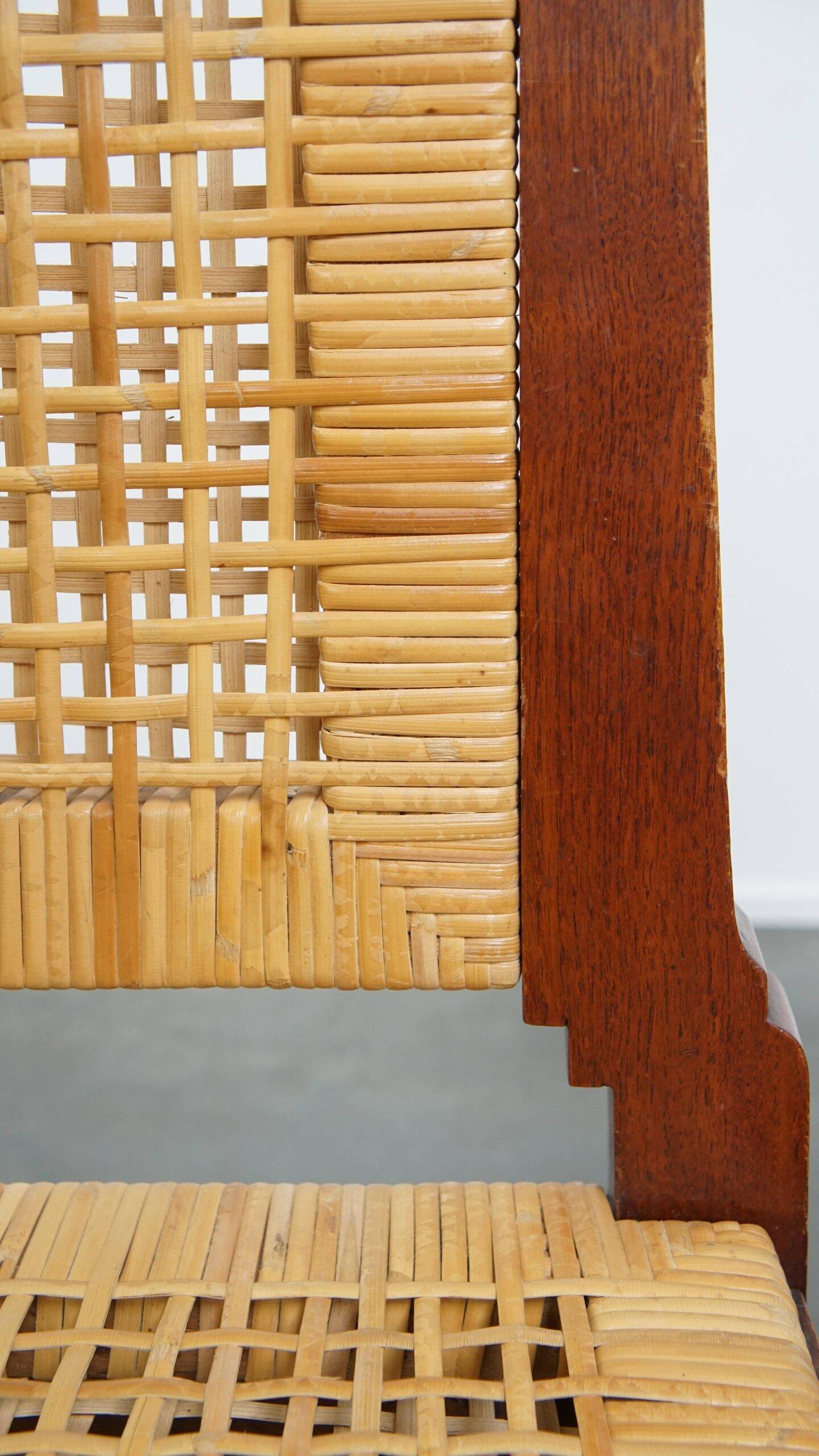 4 wooden Art Deco design dining chairs with a wicker seat and backrest