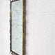 Rectangular mirror from the 50s-60s on a brass frame.