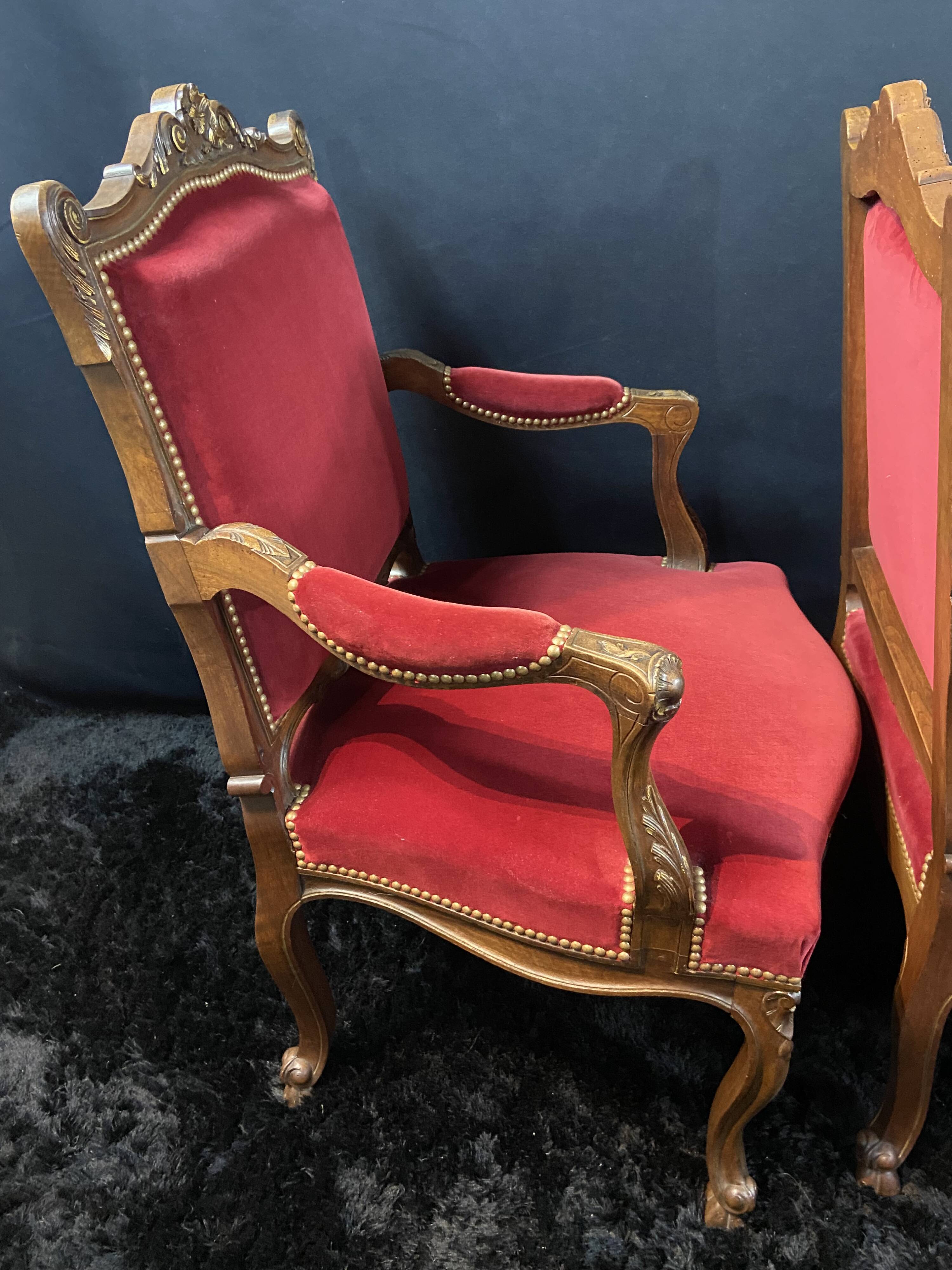 Pair of flat-back armchairs in Louis XV style in red velvet.