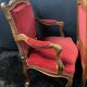Pair of flat-back armchairs in Louis XV style in red velvet.