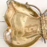Empty butterfly brass pocket