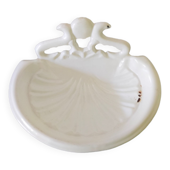 Vintage soap dish shell in white earthenware on antique enamelled cast iron bathroom décor