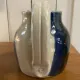 Beige and blue stoneware jug