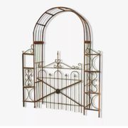 Garden arch with wrought iron gate
