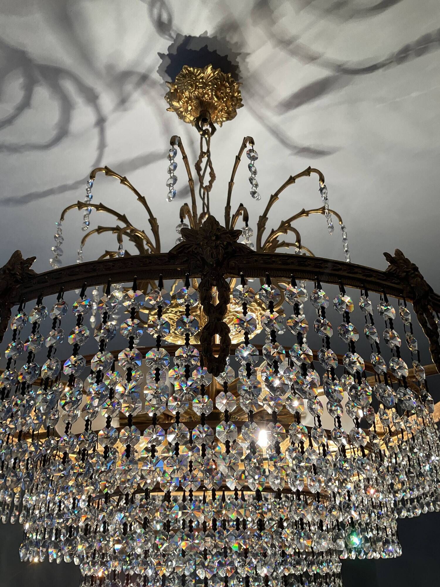 Old bronze waterfall chandelier with crystal tassels