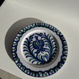 Artesania Alvarez Spanish plate in terracotta with blue plant motif.