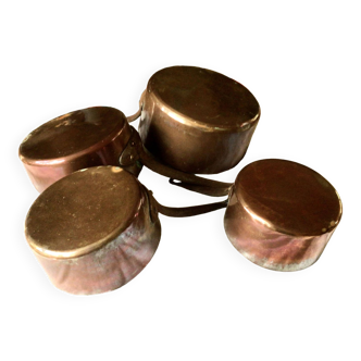 set of 4 copper saucepans