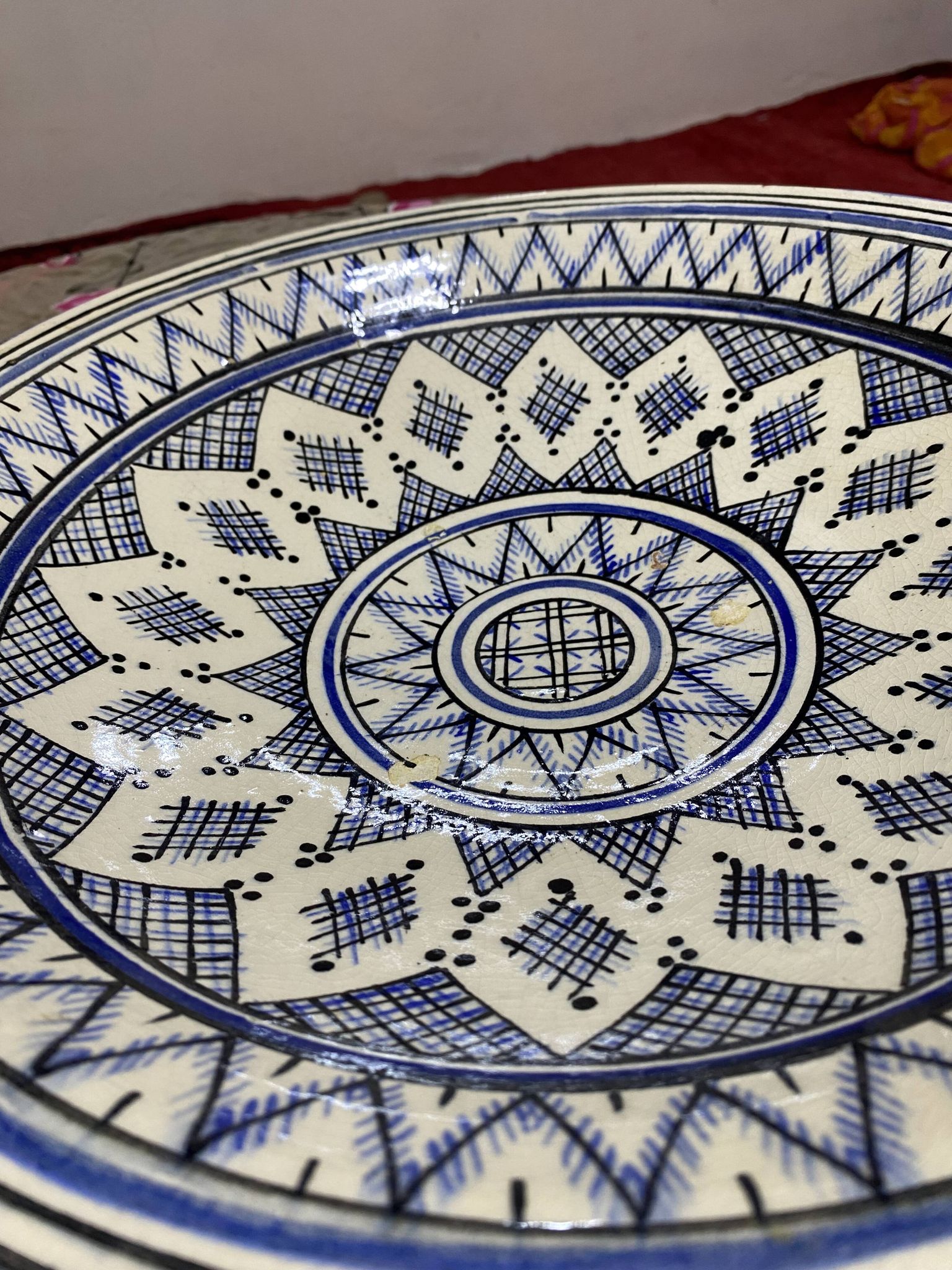 Moroccan dish in handcrafted sculpted ceramic, blue geometric patterns and
