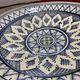 Moroccan dish in handcrafted sculpted ceramic, blue geometric patterns and