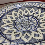 Moroccan dish in handcrafted sculpted ceramic, blue geometric patterns and