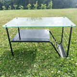 Roche Bobois metal and glass coffee table with magazine rack from the 50s