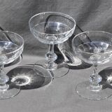 9 old champagne glasses in flat-waisted blown glass
