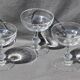 9 old champagne glasses in flat-waisted blown glass