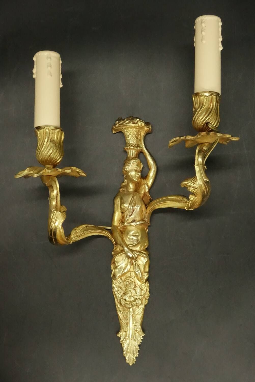 Pair of large caryatid wall sconces in Louis XV style from the 19th century - gilded bronze.