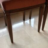 Set of 2 wooden chairs with padded seats.